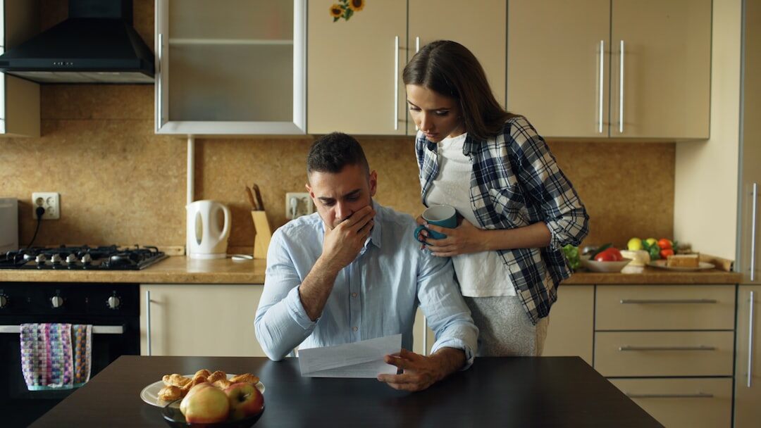 couple reviewing documents at home